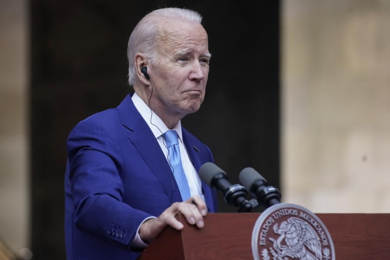 President Joe Biden listens during a news conference with Mexican President Andres Manuel Lopez Obrador and Canadian Prime Minister Justin Trudeau at the 10th North American Leaders' Summit at the National Palace in Mexico City, Tuesday, Jan. 10, 2023. (AP Photo/Andrew Harnik)